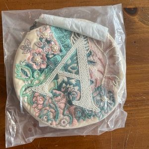 Brand new tasseled monogram purse from BHLDN.